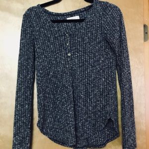 A grey knit long sleeve